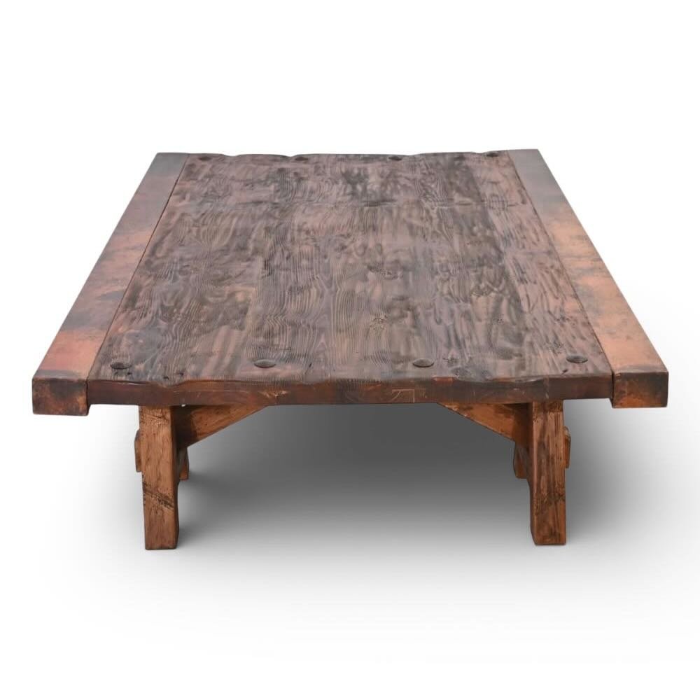 Handmade Floresville copper edge coffee table with A-frame base, distressed wood top, and clavos accents.