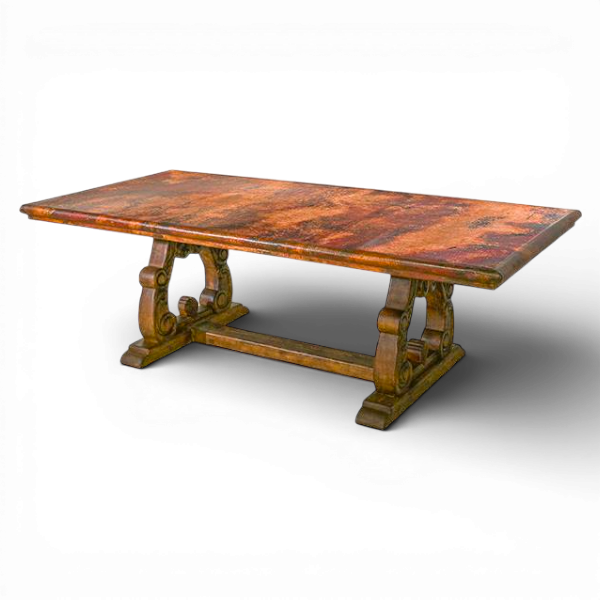 An antique wooden table with a marble top and ornate carved legs.