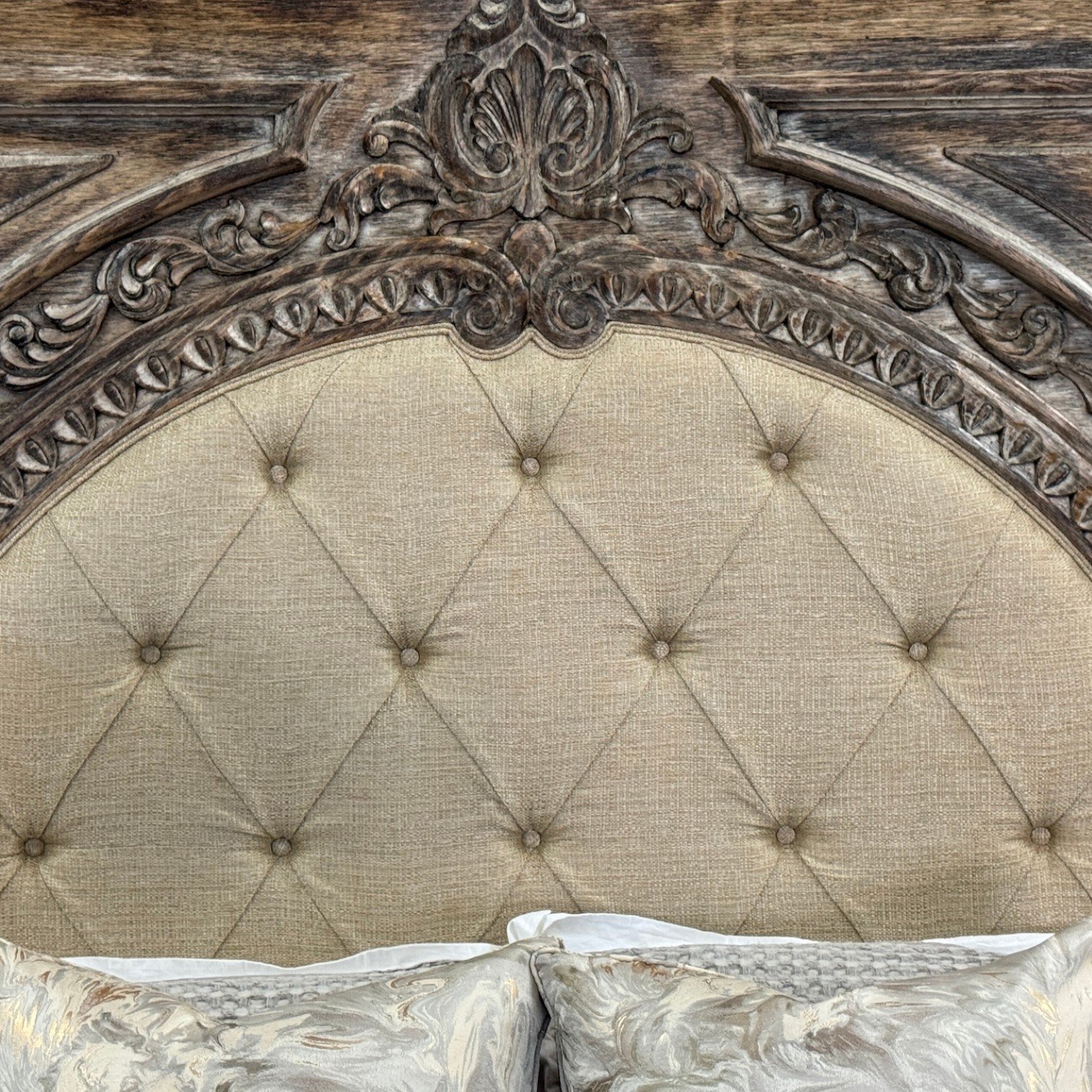 Handmade whitewashed king bed with button-tufted upholstered headboard