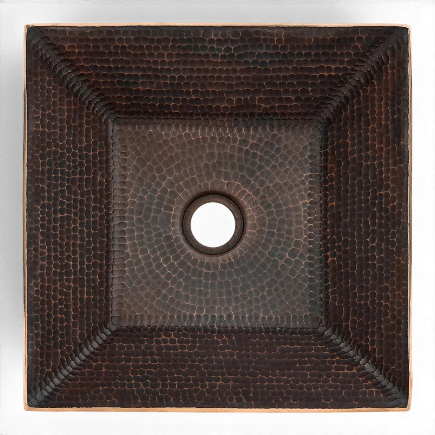 Hacienda Old World 14-inch square hand forged hammered copper vessel sink with oil rubbed bronze patina.