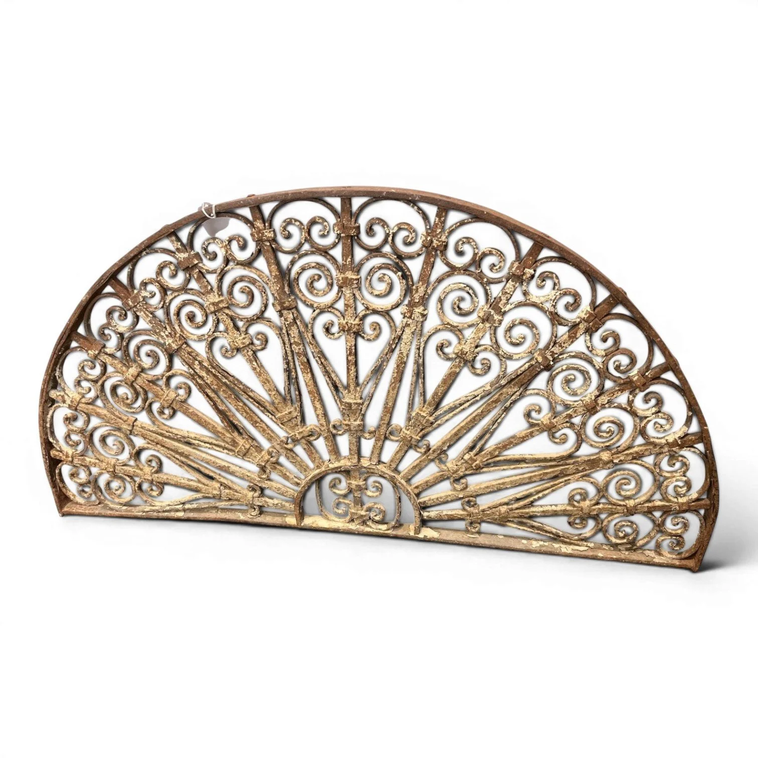 Handcrafted antique iron transom from India featuring intricate architectural ironwork and historic character.