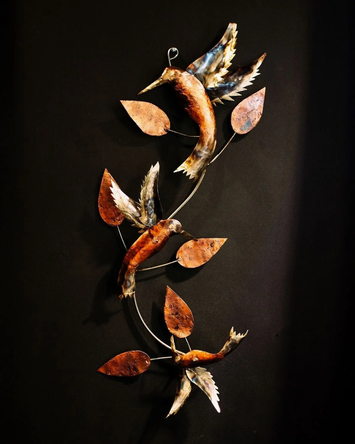 Shop the Colibrí de Cobre handmade in Mexico. Hand-cut metal and copper hummingbird wall art with elegant artisan Southwestern design.