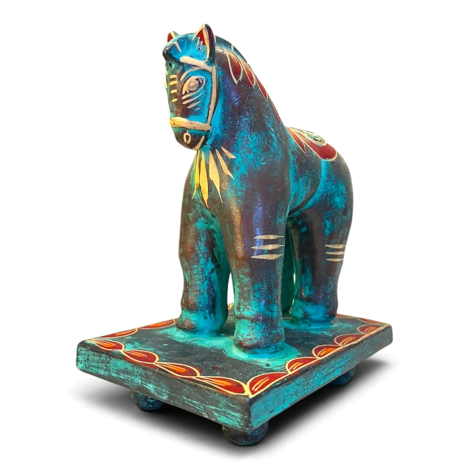 Handmade clay Trojan horse figure with unique hand-painted design on a pedestal
