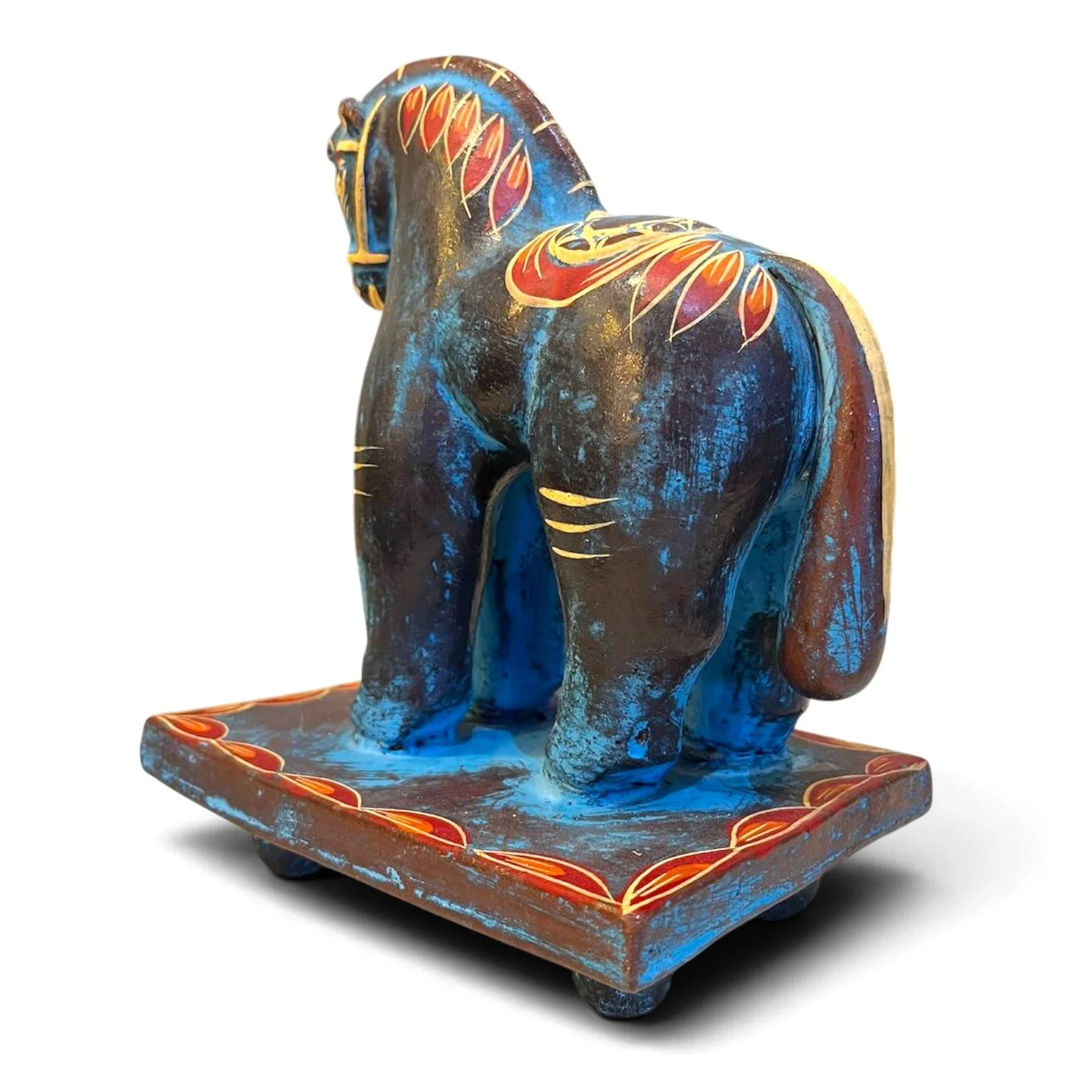 Handmade clay Trojan horse figure with unique hand-painted design on a pedestal