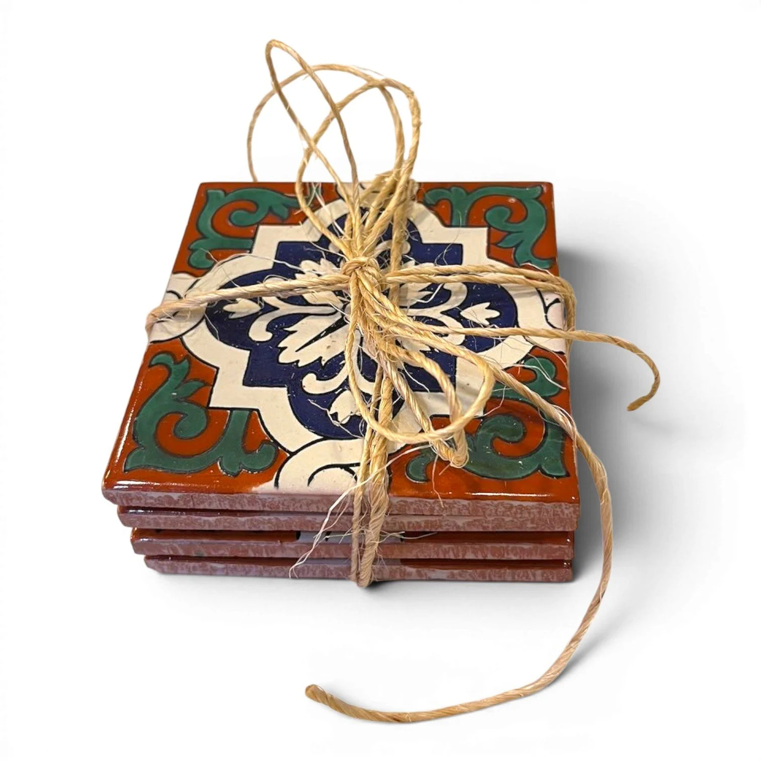 Set of four colorful Talavera tile coasters with hand-painted Mexican pottery designs