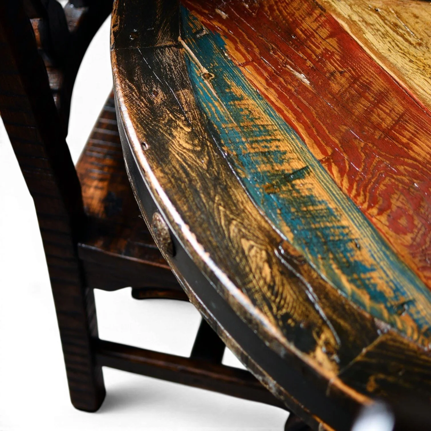 Handmade Mexican round reclaimed wood dining table with hand-painted top, iron trim, and clavos