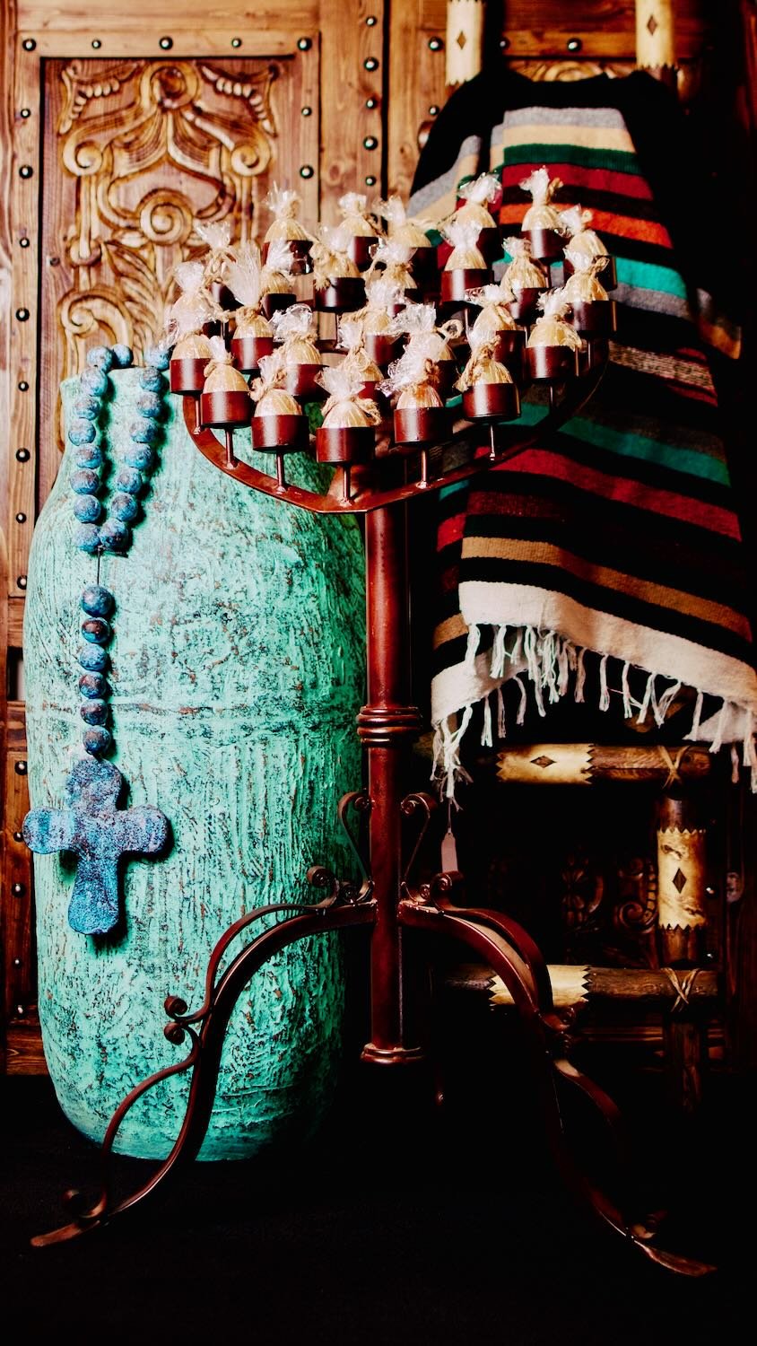 Handmade Mexican wrought iron heart candelabra centerpiece with bronze finish and elegant scrollwork