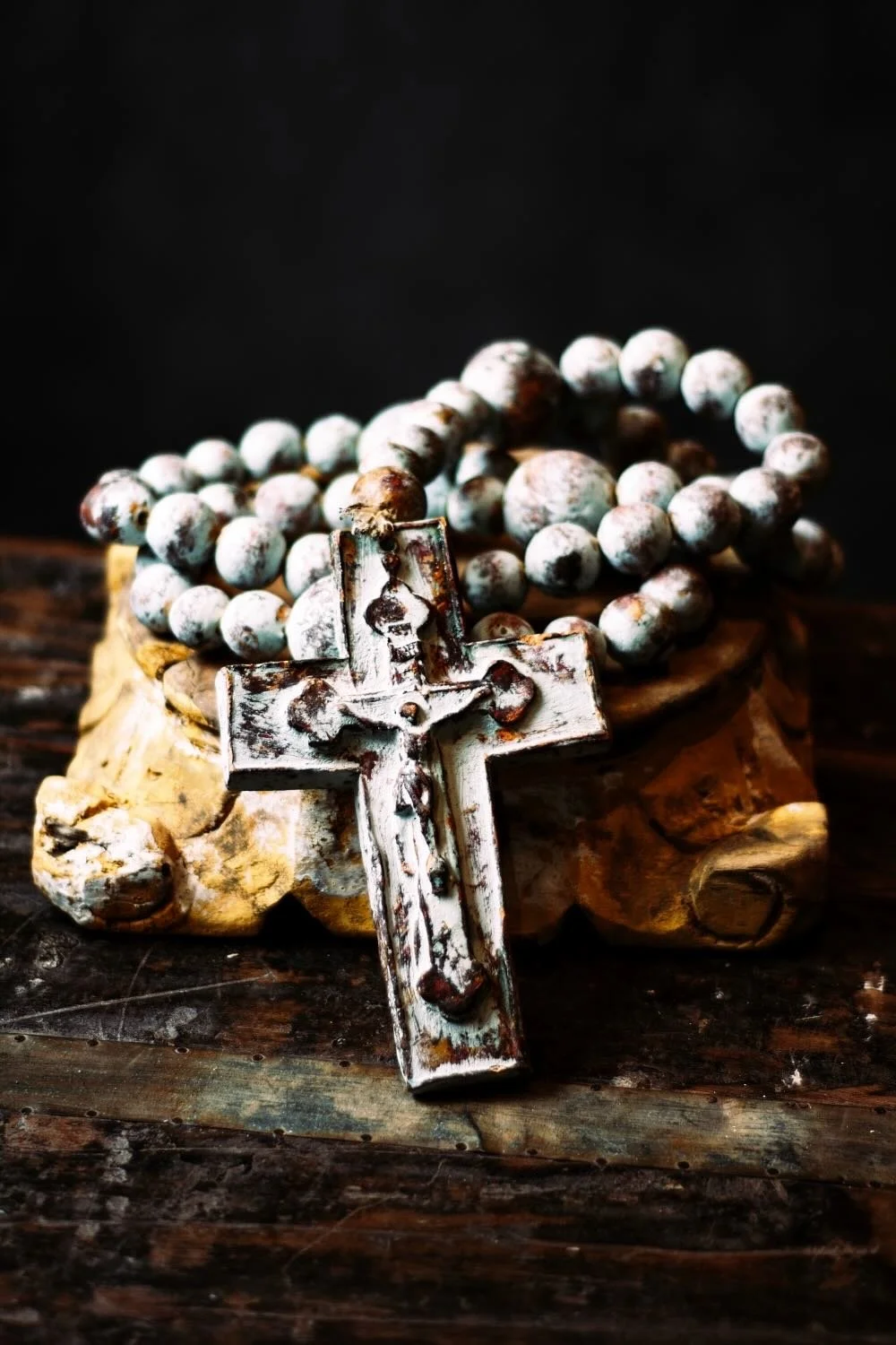 Rosario de Barro - Turquoise. Oversized 45" turquoise clay rosary from Milagros Rústicos. Handcrafted in Mexico with a distressed finish. Ideal for large-scale decor.