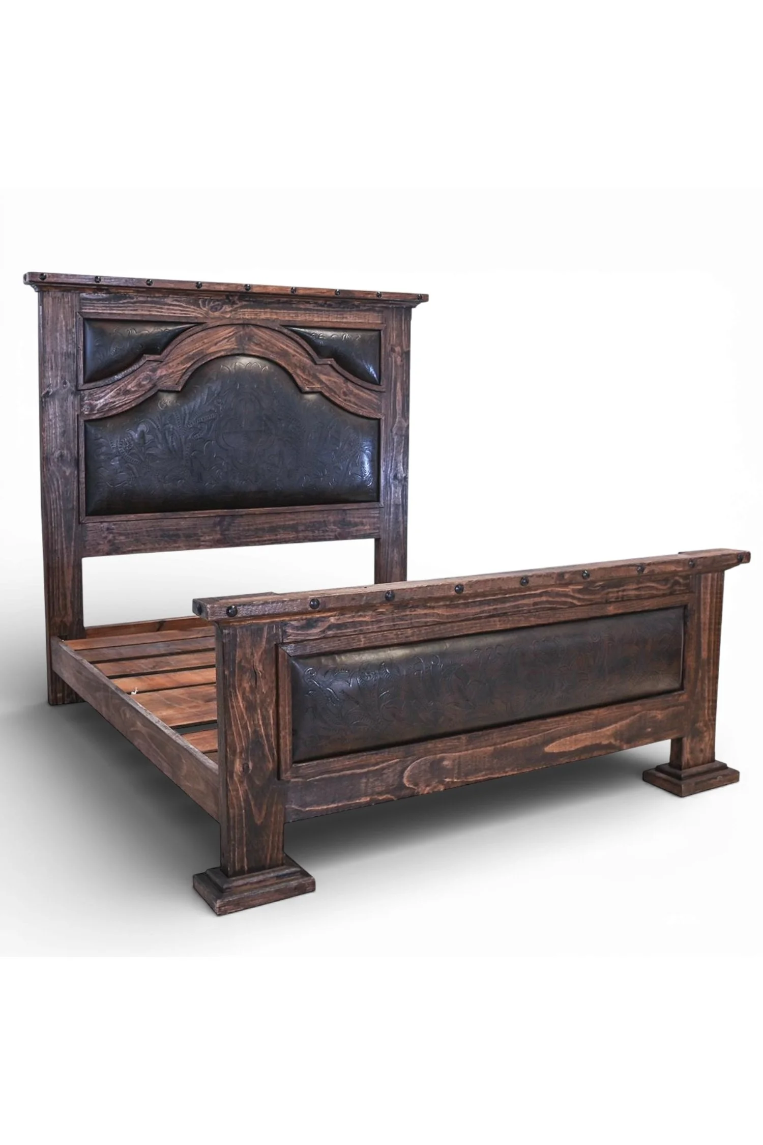 Shop a handmade tooled leather bed from Mexico. Rustic reclaimed wood frame with artisan craftsmanship for elegant hacienda-style bedrooms.