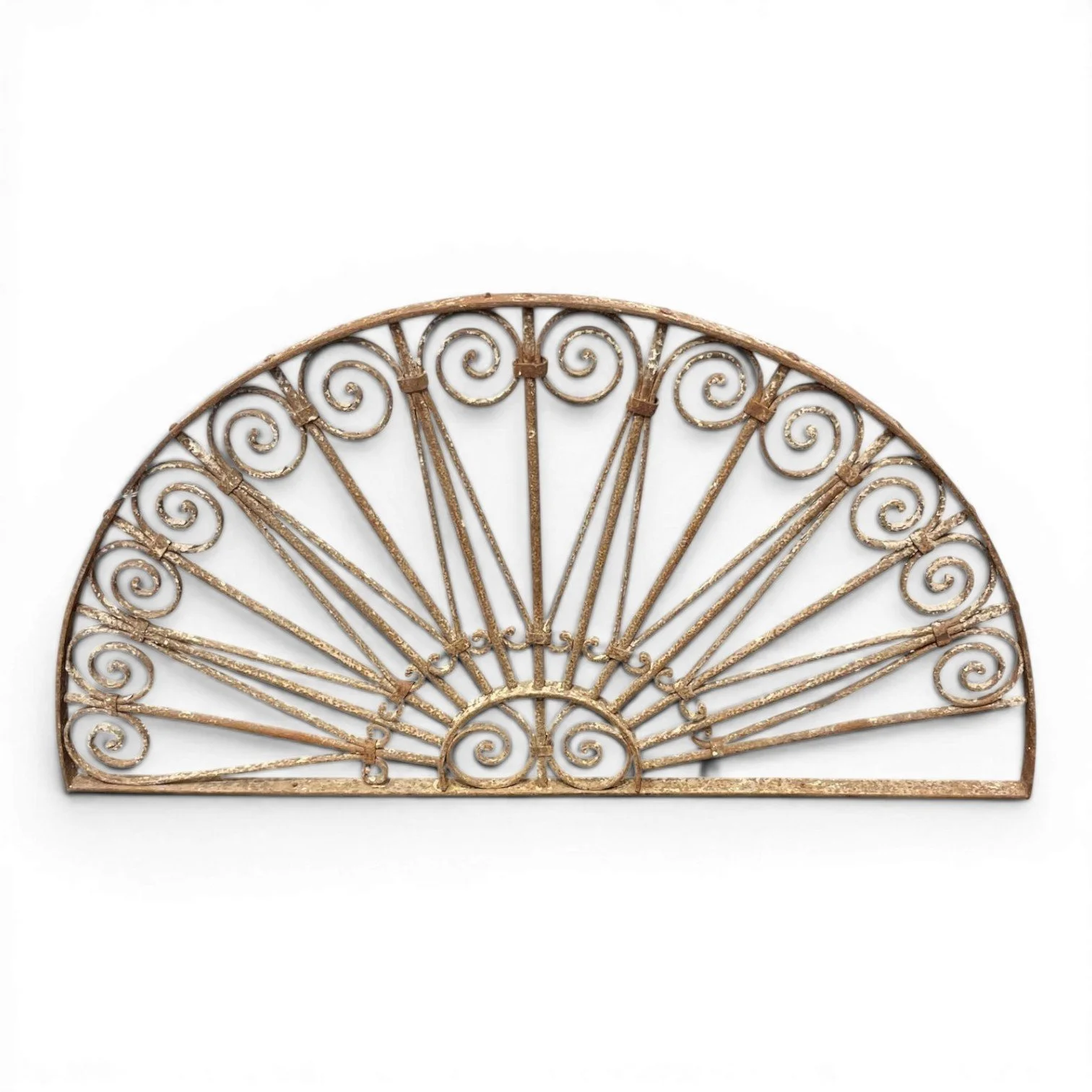Handcrafted antique iron transom from India featuring intricate architectural ironwork and historic character.
