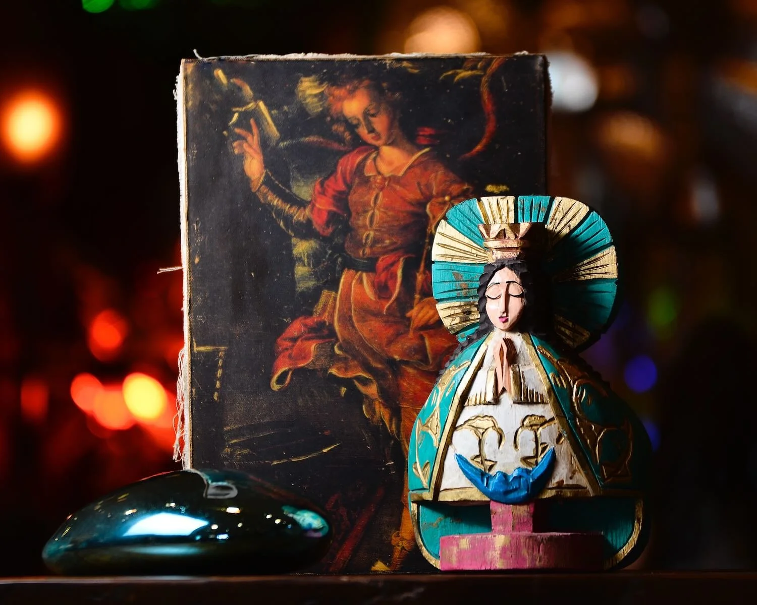 Hand carved Guadalupe and hand painted Angel from Mexico.
