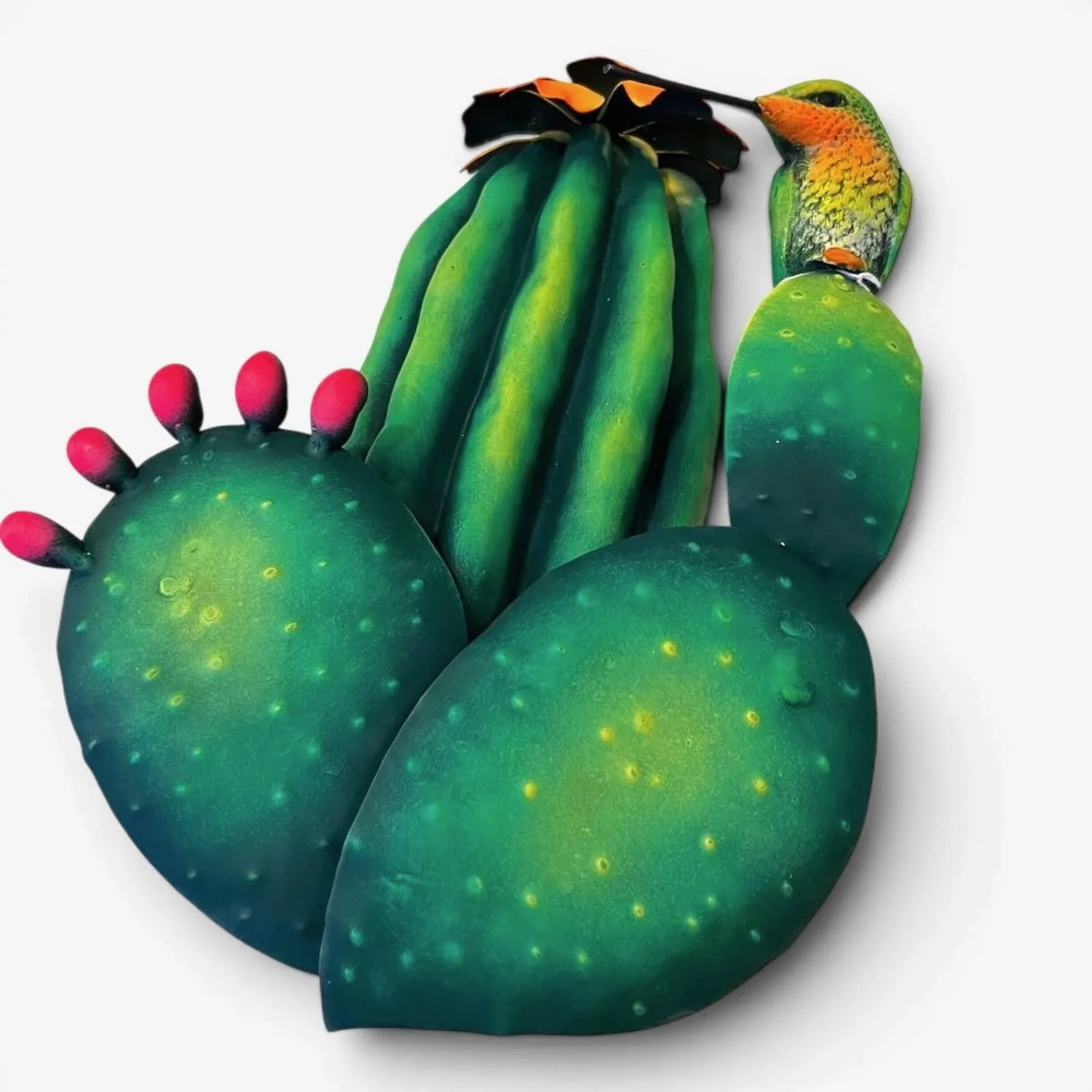 Handmade Mexican metal wall art featuring a colorful hummingbird perched on a prickly pear cactus with a saguaro cactus in the background.