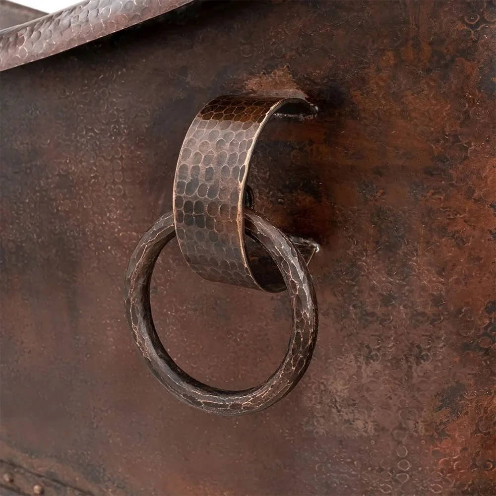 Handmade Hacienda 67-inch hammered copper double slipper bathtub with decorative copper ring accents crafted in Mexico.