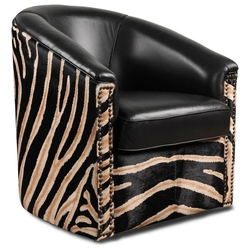 The Zebra Leather Swivel Chair features black top-grain leather, zebra cowhide accents, and smooth swivel functionality for a bold Western-modern statement.