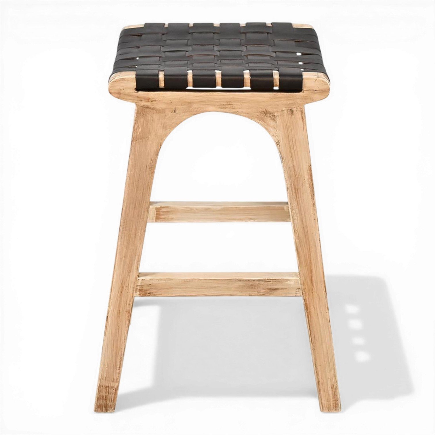 Handmade Cambria crisscross black leather bar stool with natural wood frame crafted in Mexico.