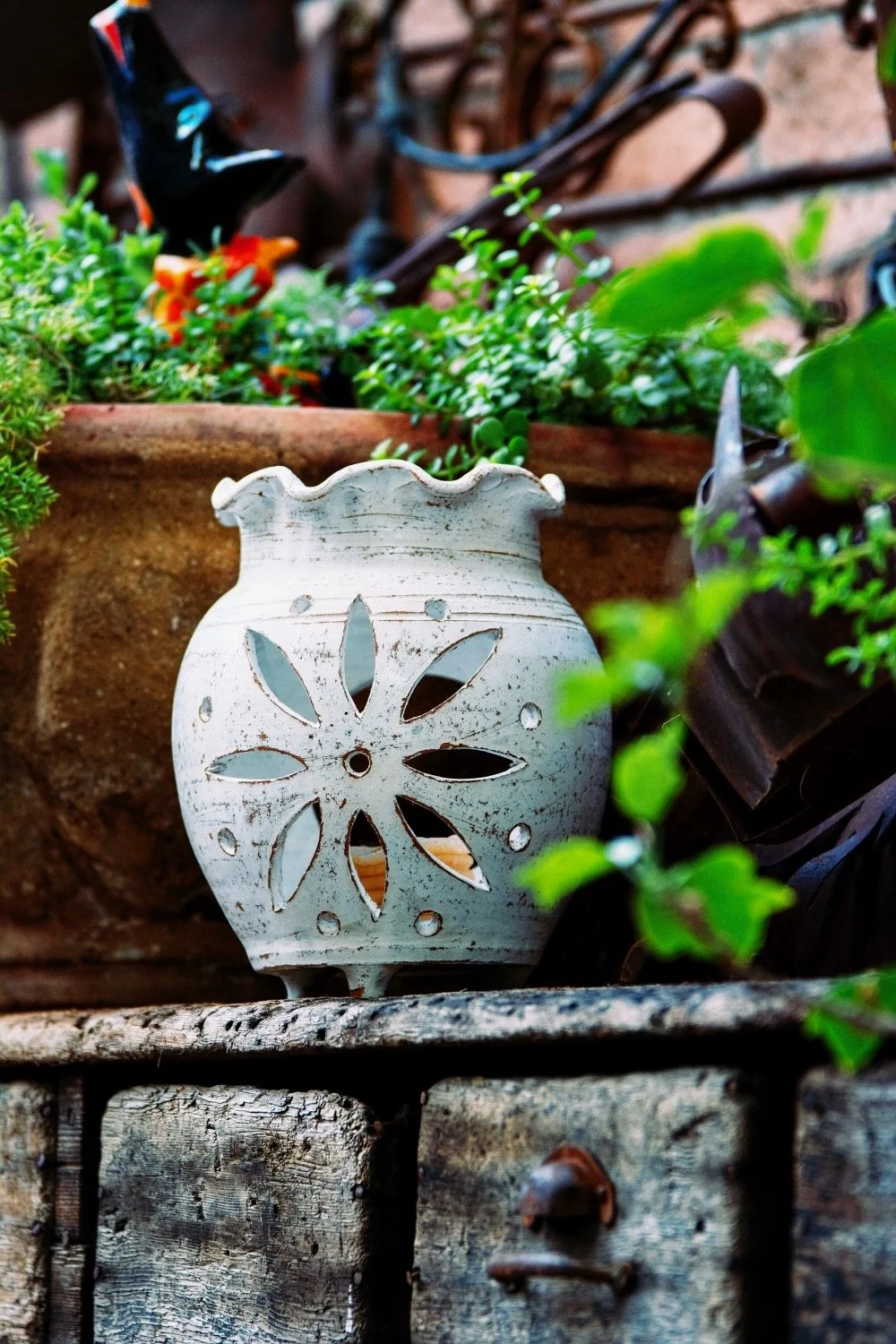 New style white clay cutout chimineas from Mexico. Grab them at Milagros Rústicos in Arizona.