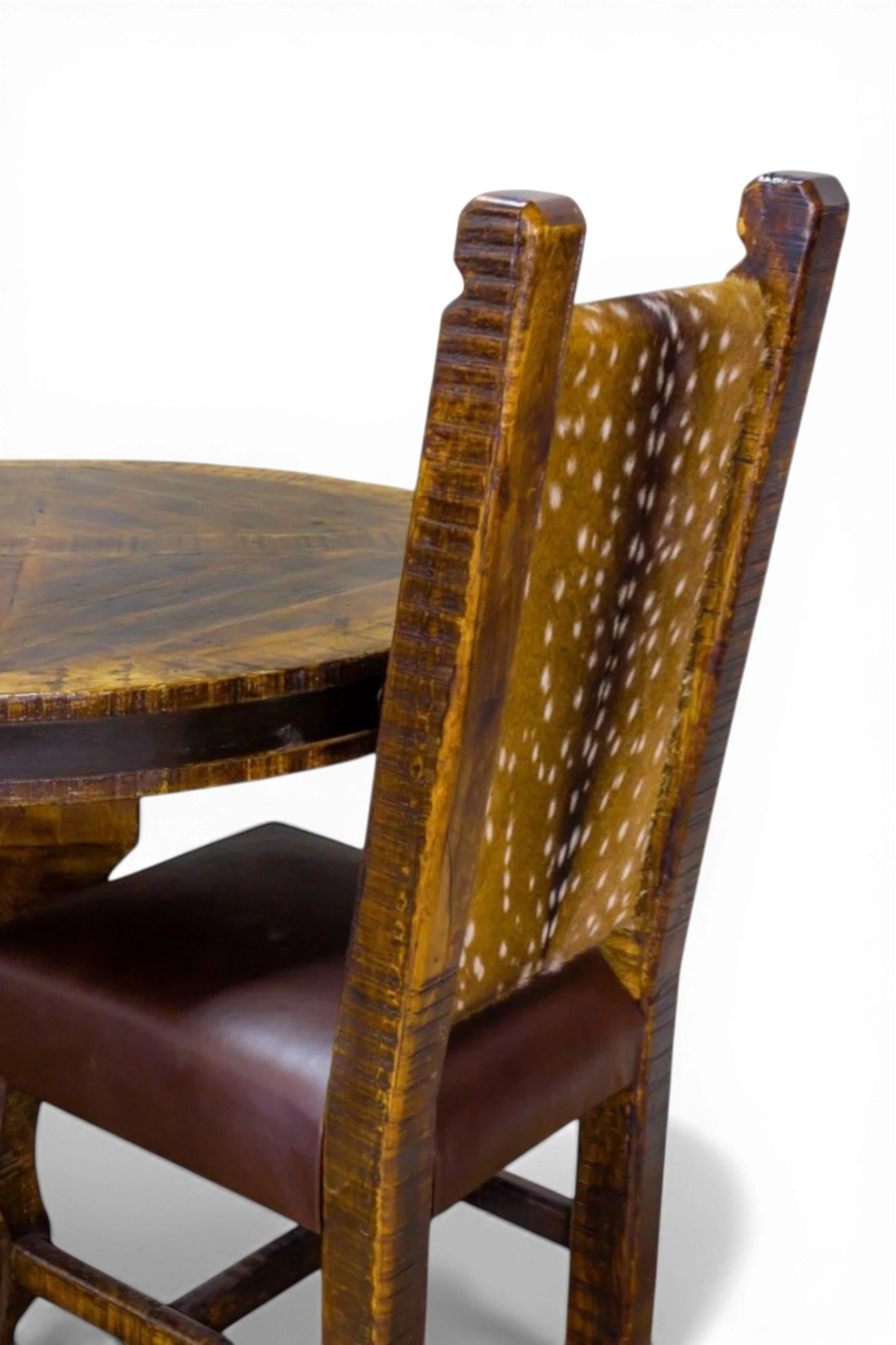 Shop a handmade leather dining chair from Mexico with deer design, reclaimed wood, and carved details. Rustic statement seating for dining spaces.