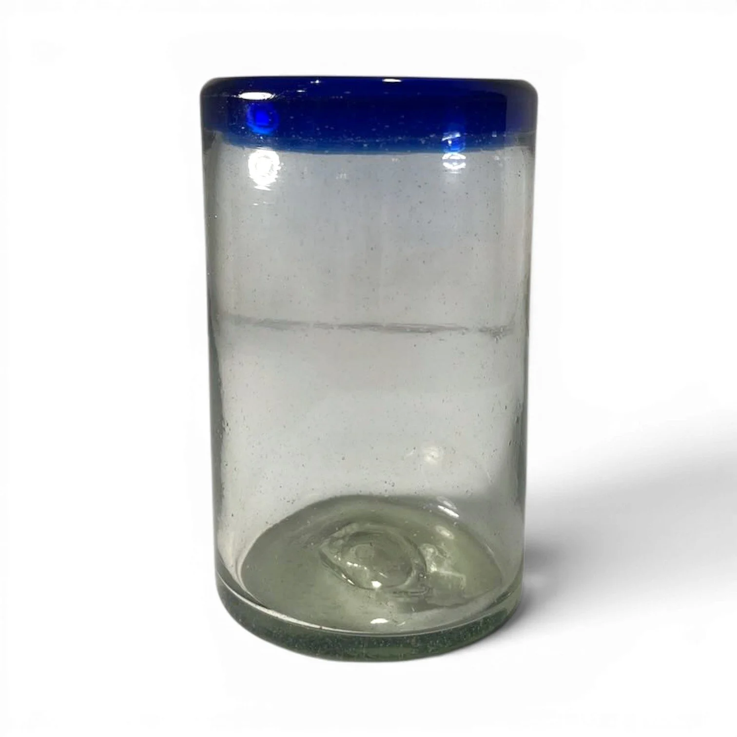 Handmade Mexican Cantina tall glass with traditional cobalt blue rim and handblown artisan craftsmanship.