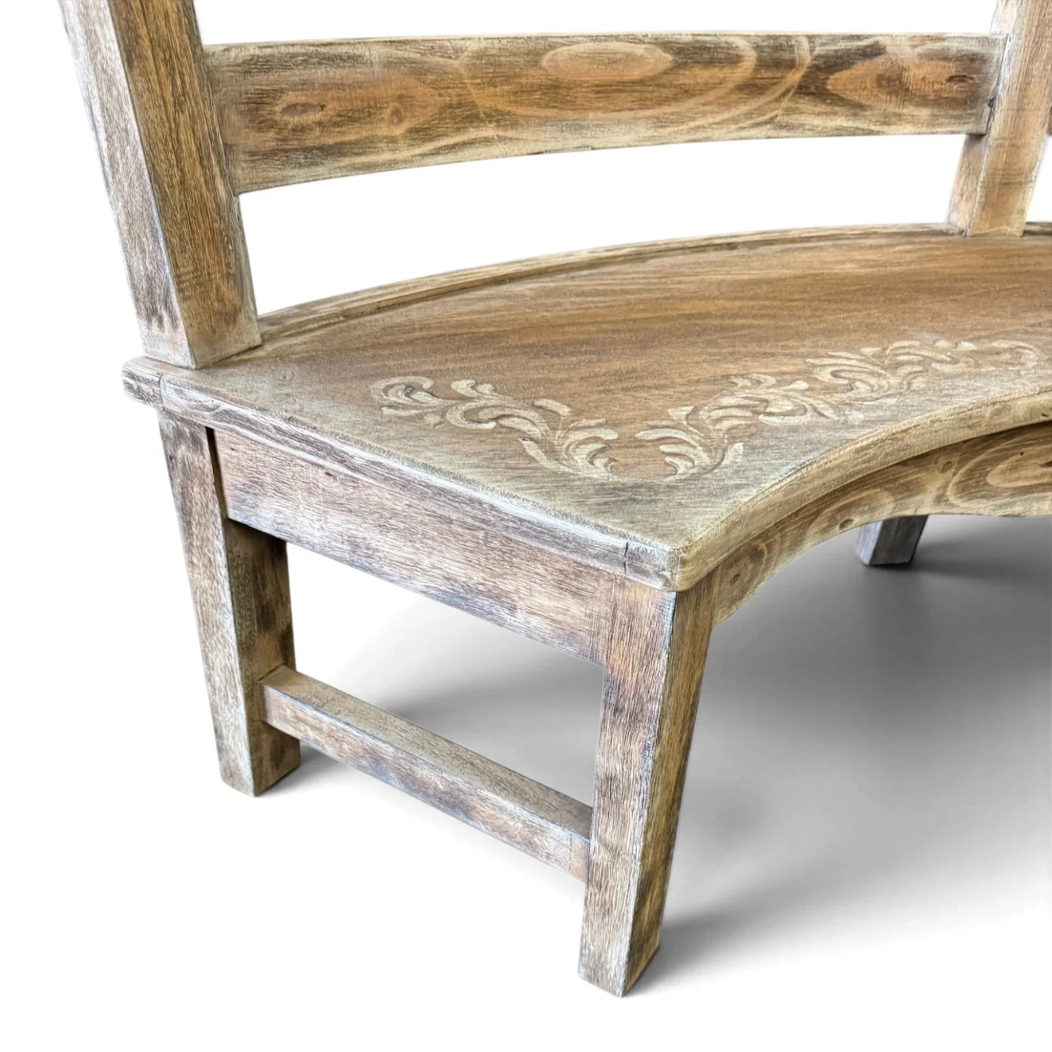 Handmade whitewashed curved wood bench with carved floral details