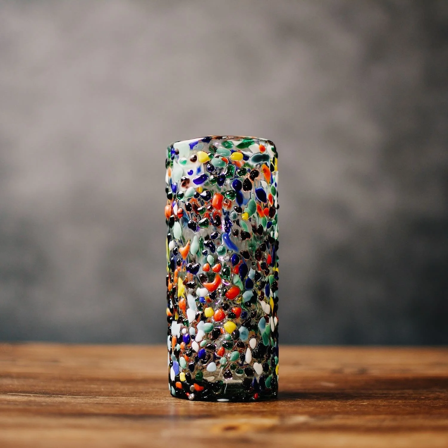 Handblown Mexican Guanajuato confetti Collins glass with colorful textured artisan finish.