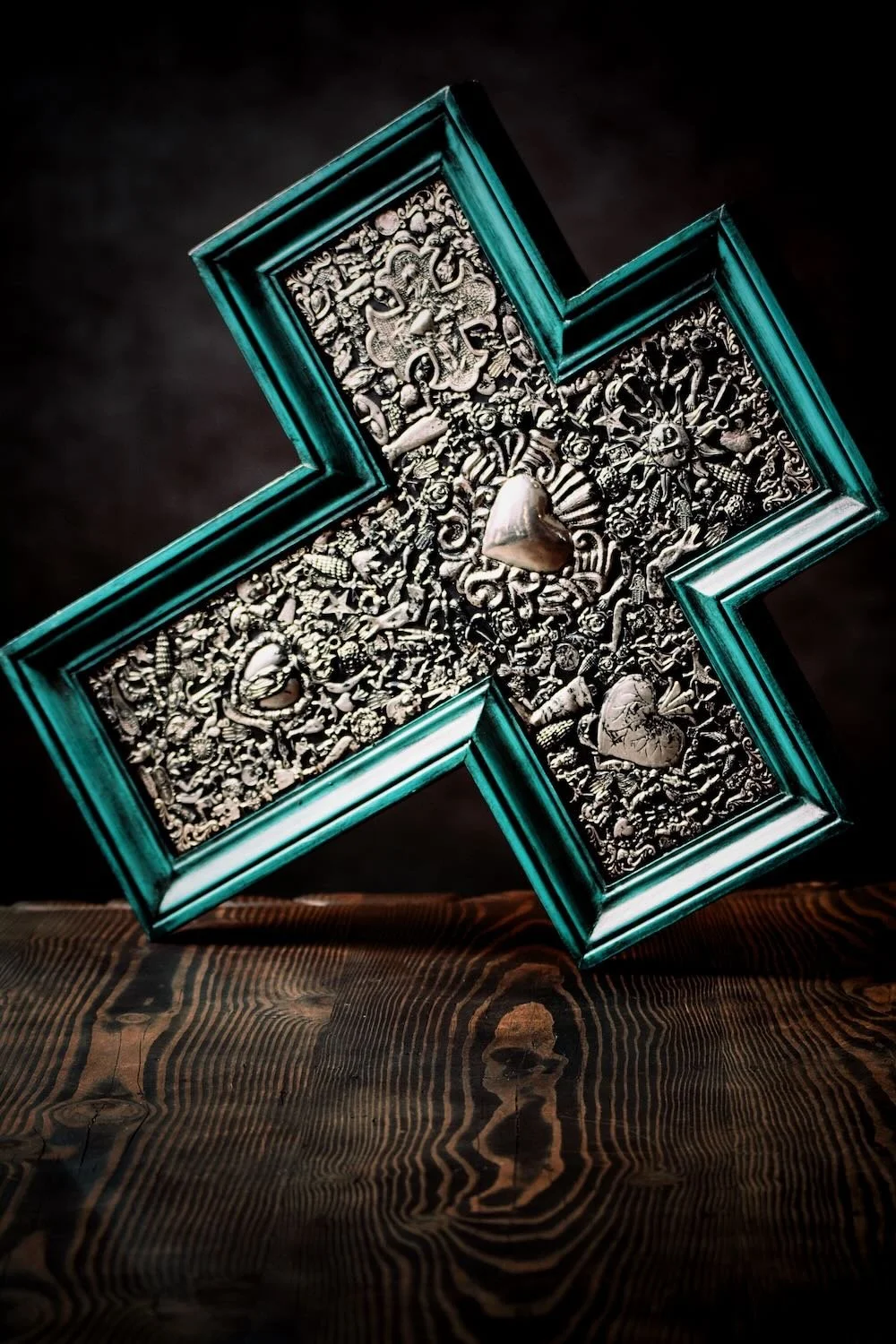 Cruz Milagros Grande Turquesa - Shop a large handmade Milagros cross from Mexico. Turquoise wooden wall decor with symbolic charms and rustic artisan craftsmanship.