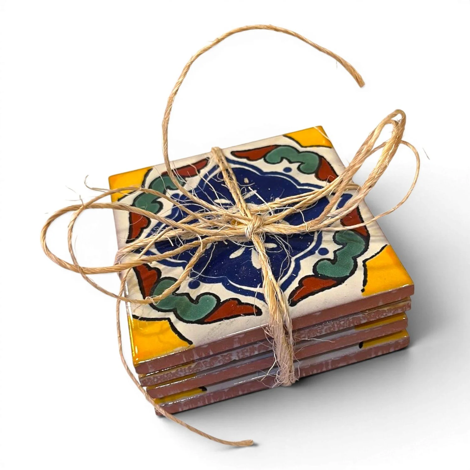 Set of four colorful Talavera tile coasters with hand-painted Mexican pottery designs