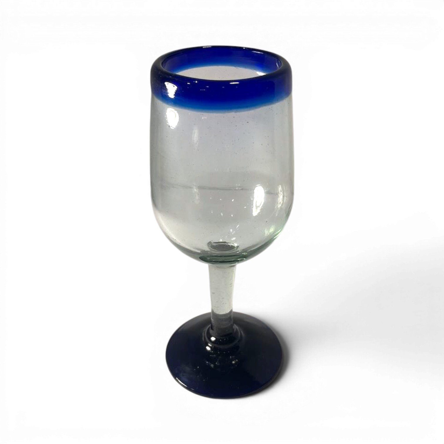 Handmade Mexican Cantina wine glass with traditional cobalt blue rim and handblown artisan glass.
