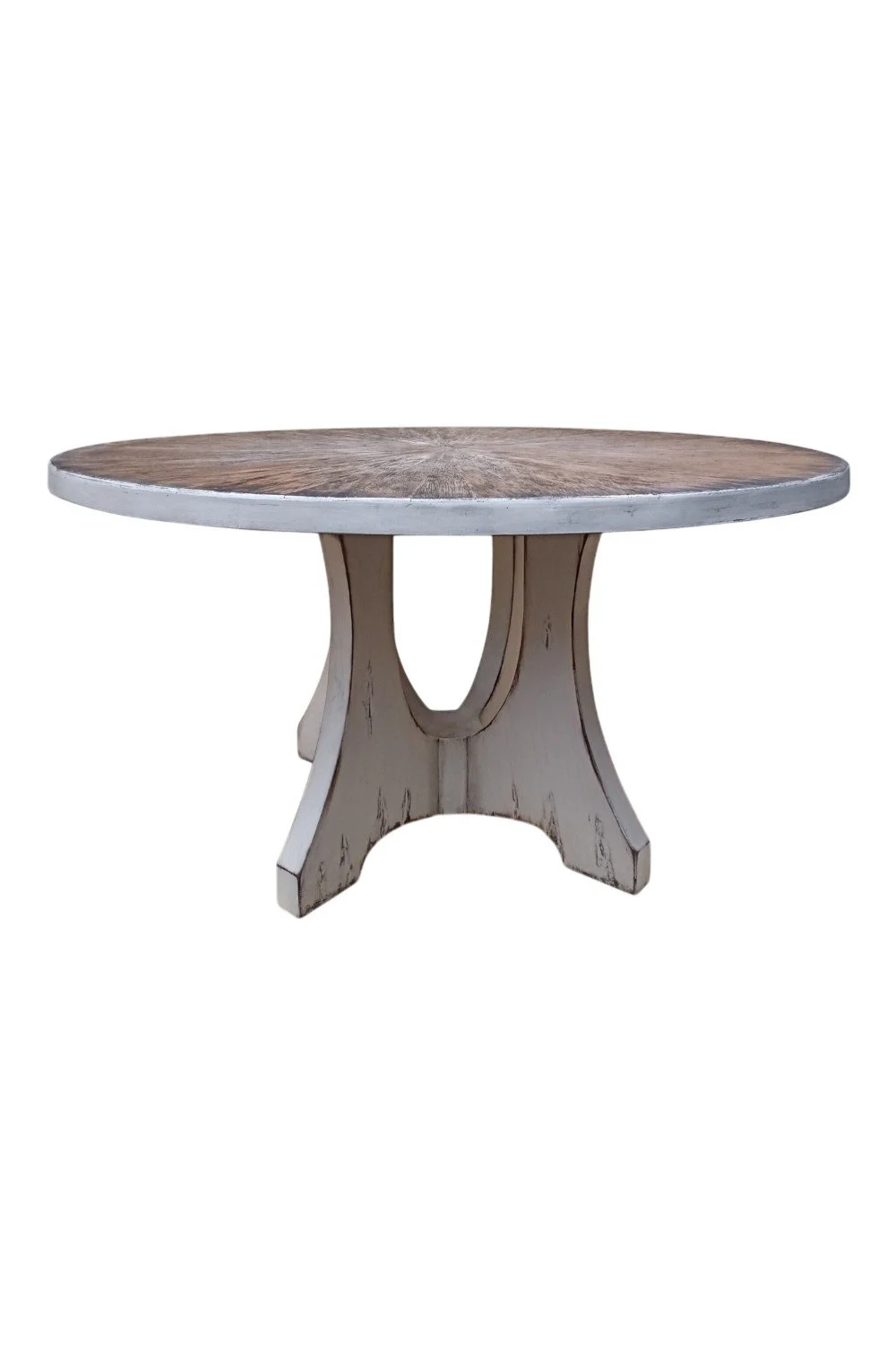 Shop the Arrozal Dining Table handmade in Peru. Round solid wood dining table with a unique hide-inspired wire-brushed finish and artisan craftsmanship.