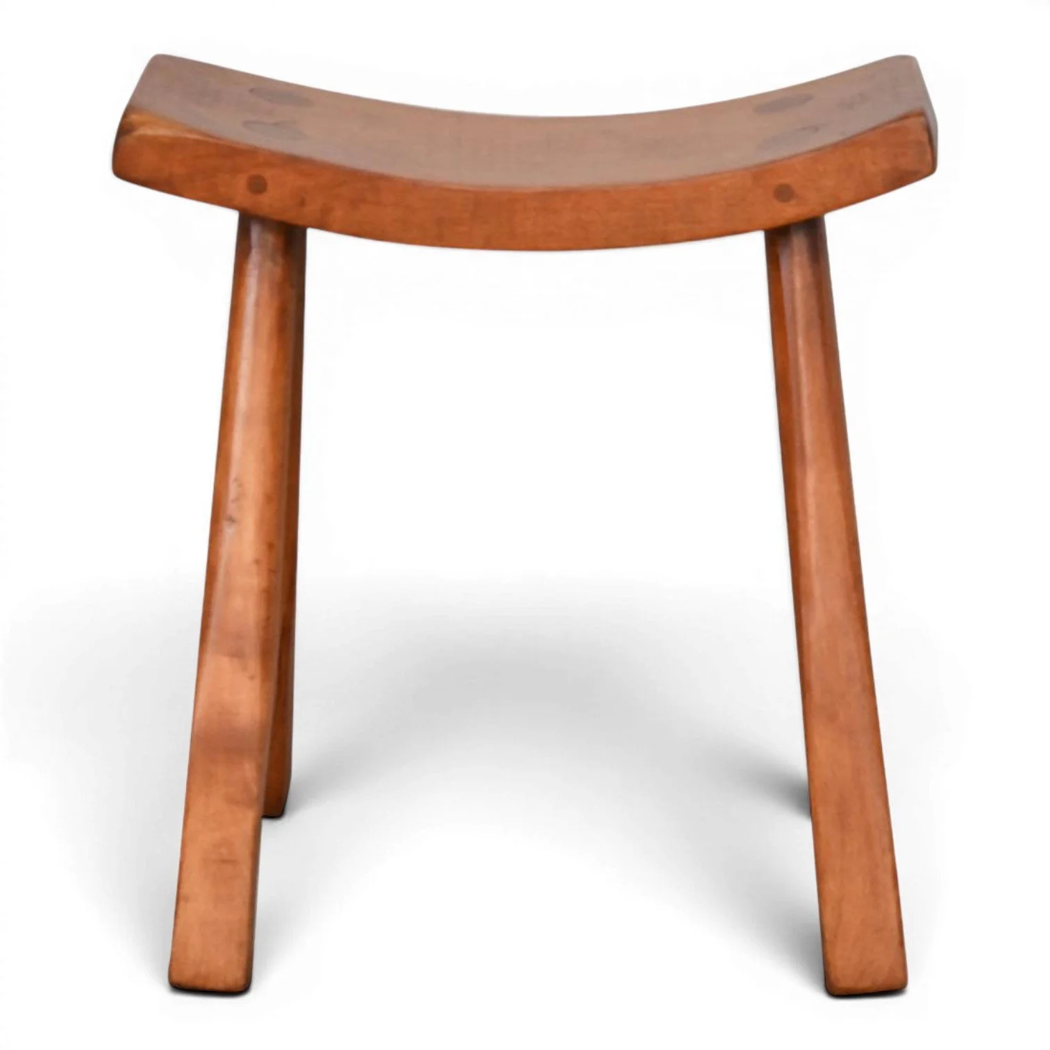 Handmade Bisbee curved solid wood stool with primitive rustic design crafted in Mexico.