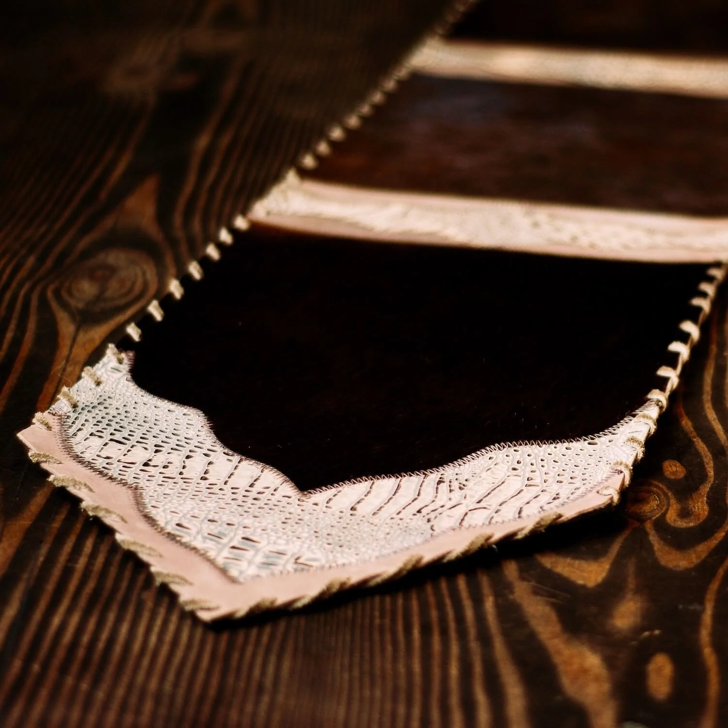 Handmade Brazilian cowhide table runner with tooled leather - Seventeen