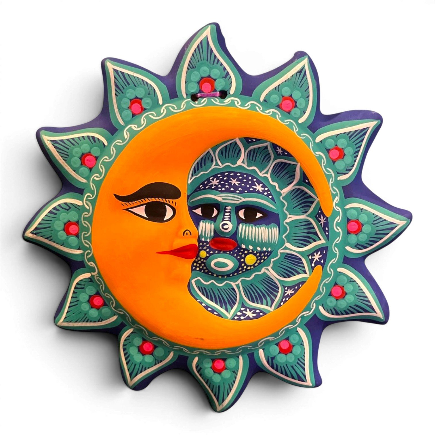 Handmade Arcilla Sol y Luna clay wall art from Oaxaca, Mexico featuring a colorful hand-painted sun and moon design.