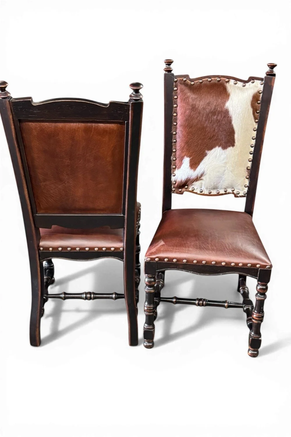 Shop a handmade leather and cowhide dining chair from Peru. Rustic wood frame with nailhead trim and unique hide backrest for stylish seating.