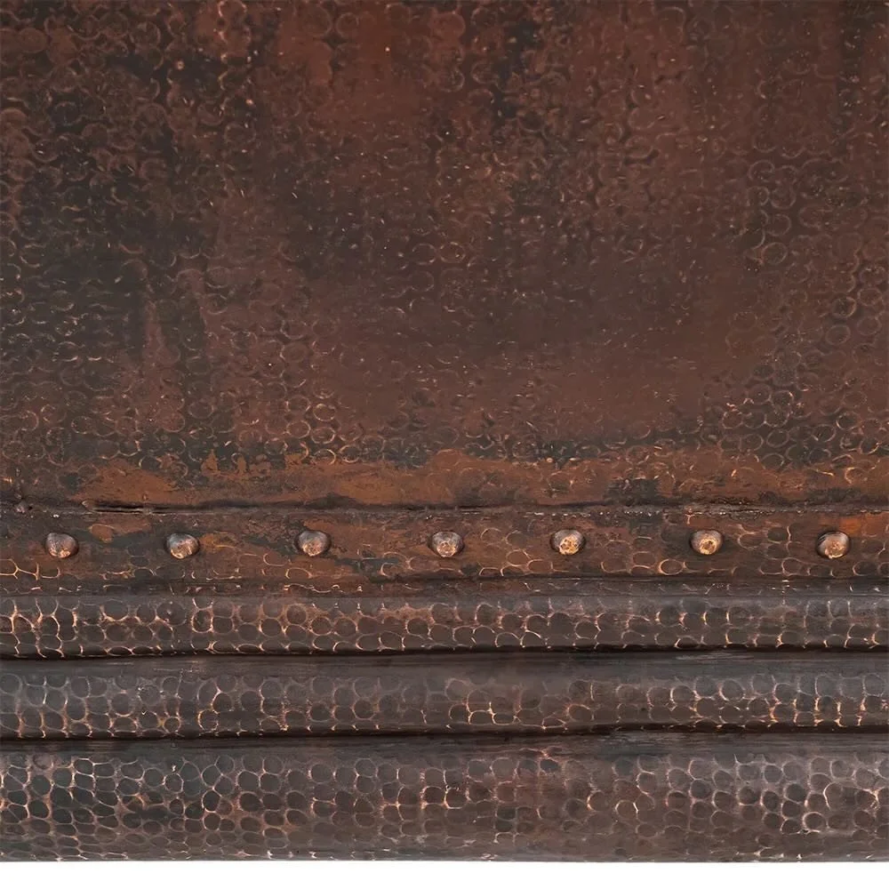 Handmade Hacienda 67-inch hammered copper double slipper bathtub with decorative copper ring accents crafted in Mexico.
