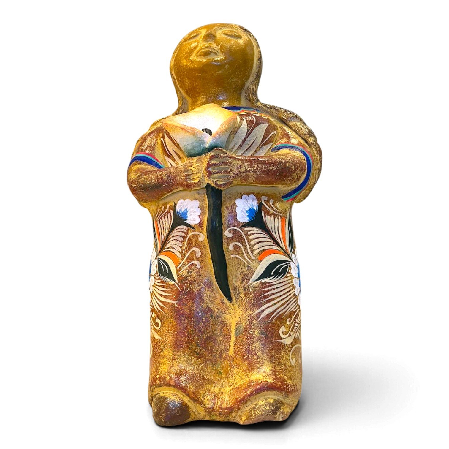 Handmade Mexican clay figure of a woman holding a calla lily