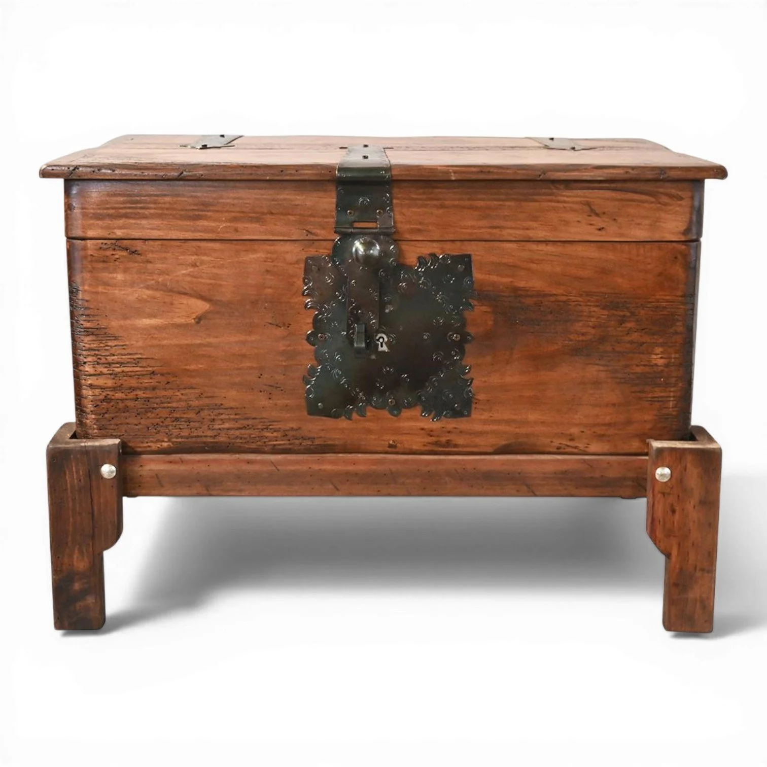 Handmade Danzante coffee table trunk with iron hardware and dark stain finish crafted in Mexico for small space storage.