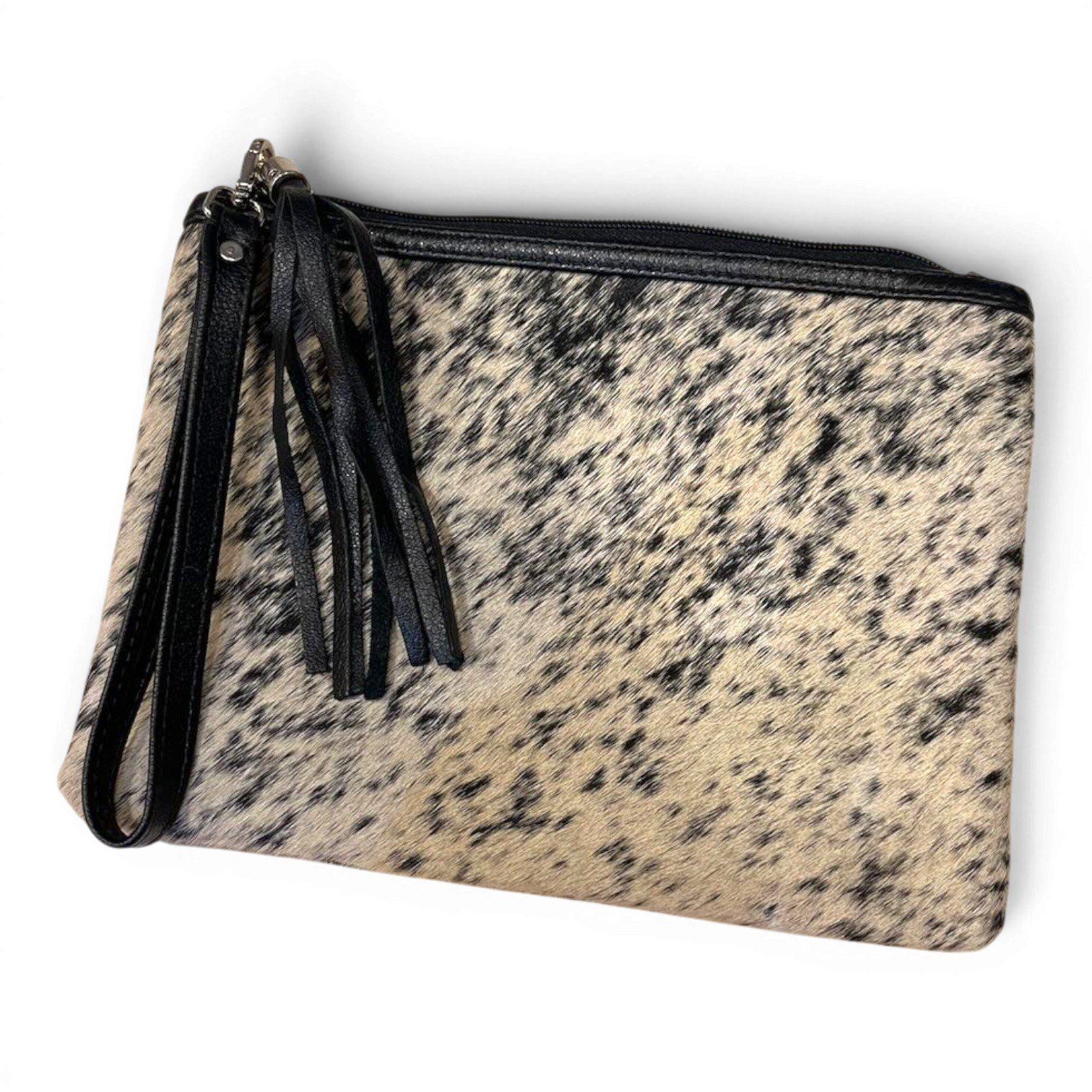 Handmade Brazilian cowhide clutch with fringe detailing, zipper closure, and wrist strap