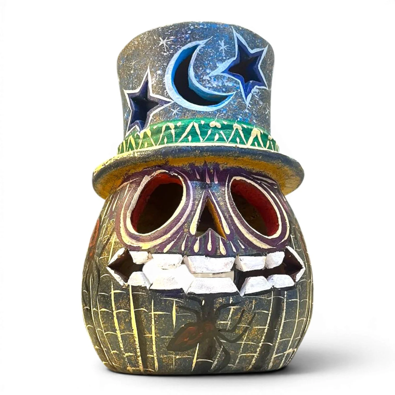 Handmade Mexican clay jack-o’-lantern with decorative top hat and moon and star cutouts