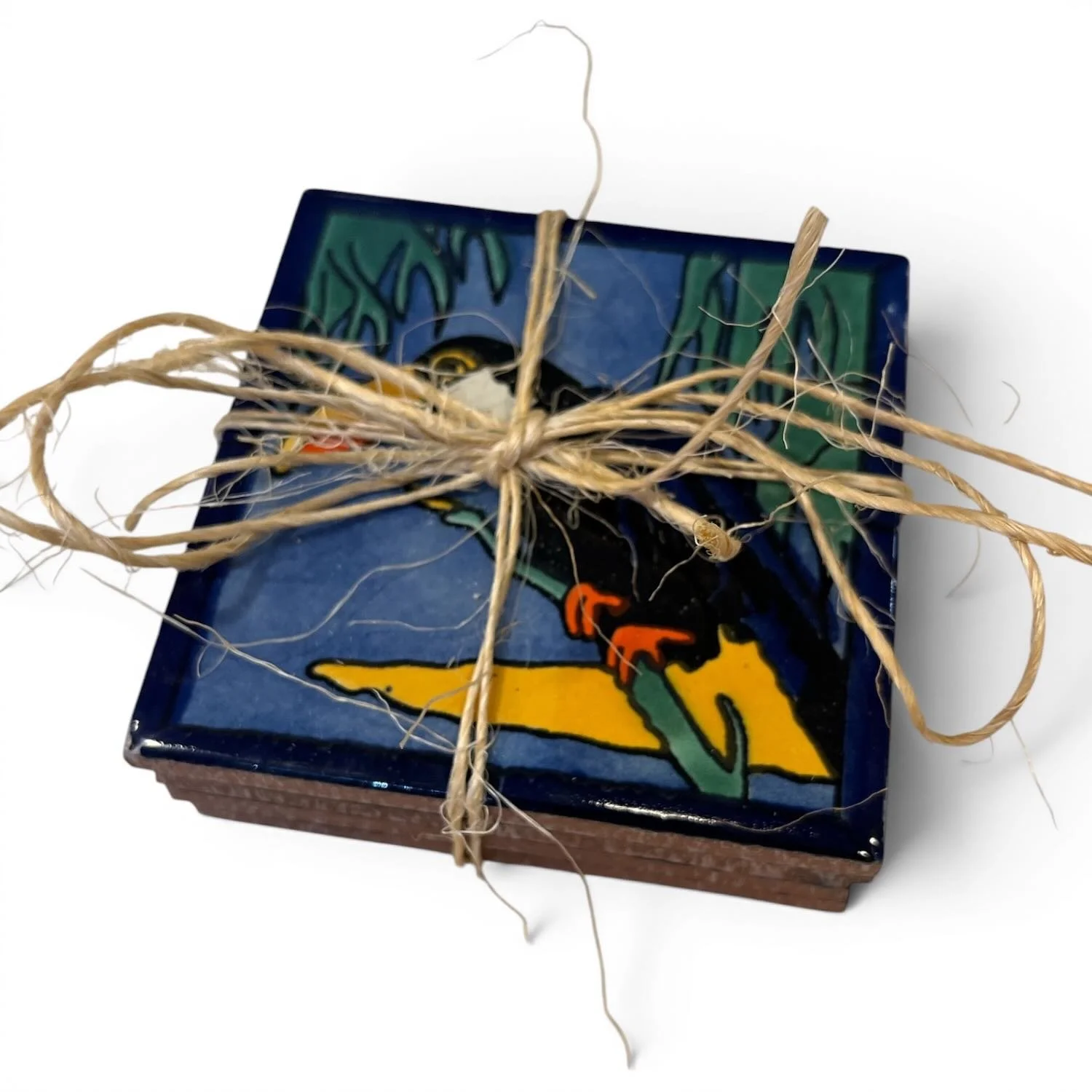 Handmade Talavera tile coaster set from Mexico featuring four colorful ceramic coasters with protective rubber bumpers.