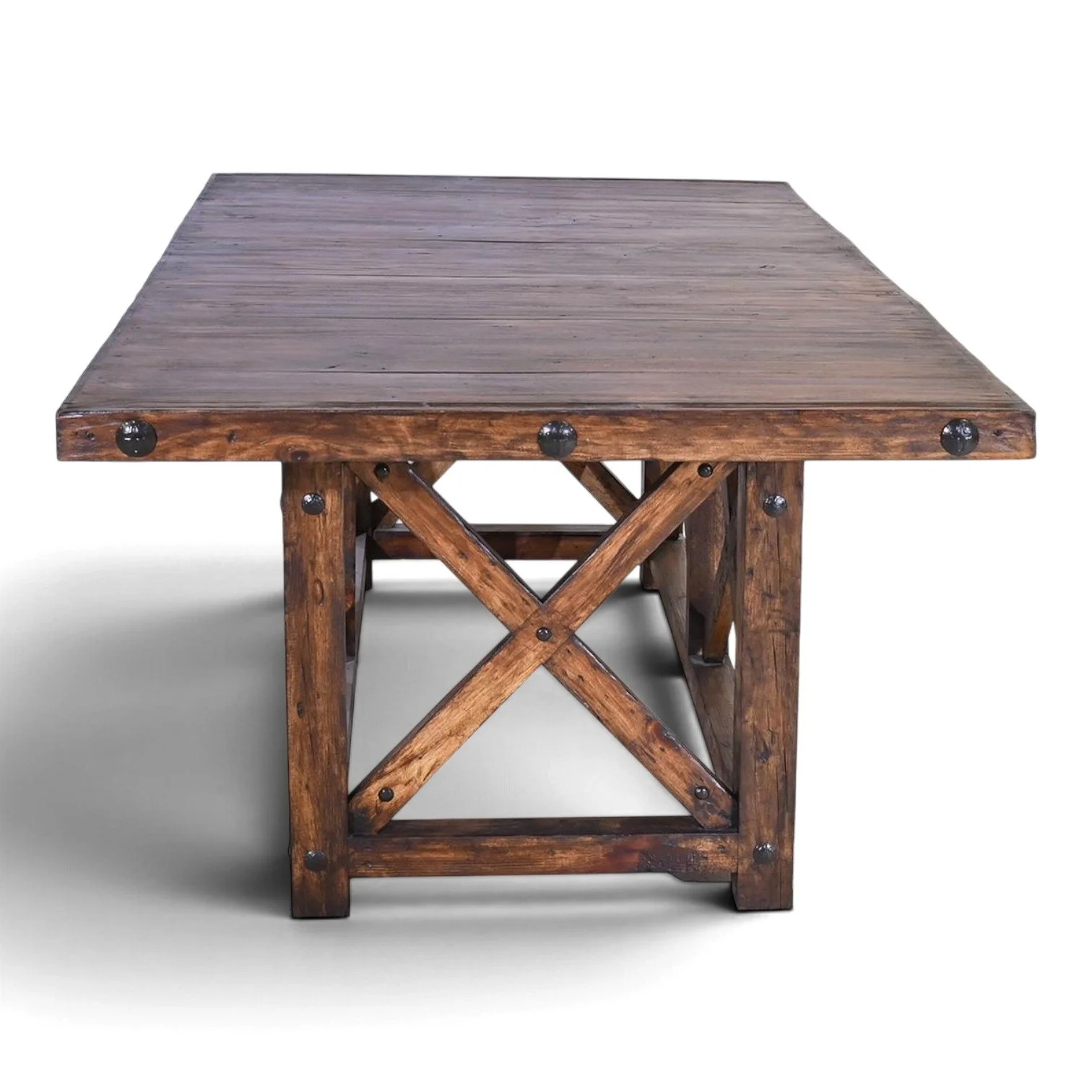 Alpine dining table with crisscross base and clavos trim, handmade in Mexico