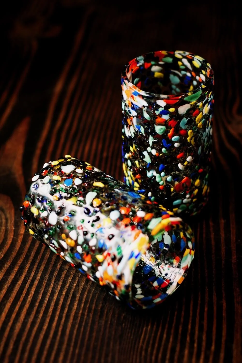 Shop a handblown Guanajuato tall tumbler from Mexico. Colorful confetti glassware perfect for everyday drinks, entertaining, and unique table settings.