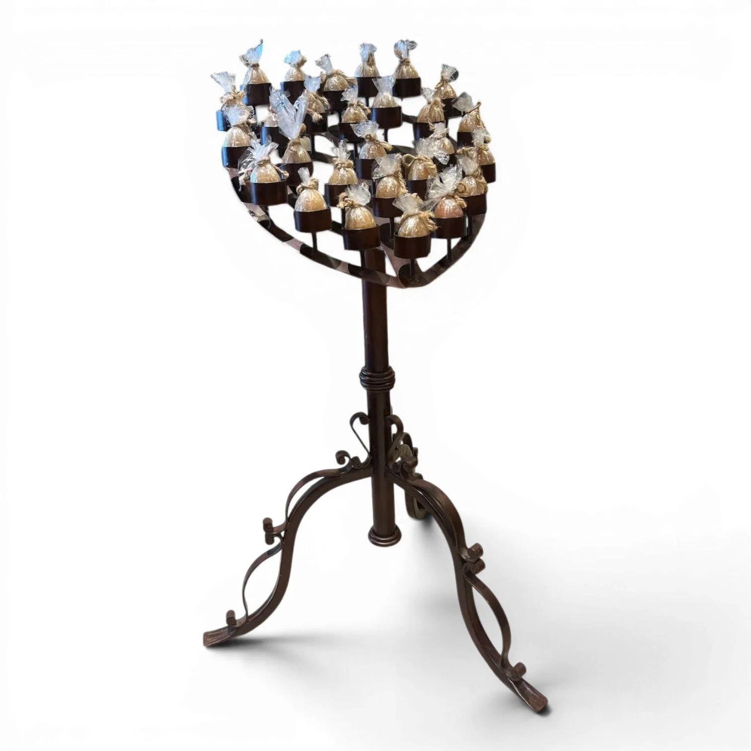Handmade Mexican wrought iron heart candelabra centerpiece with bronze finish and elegant scrollwork