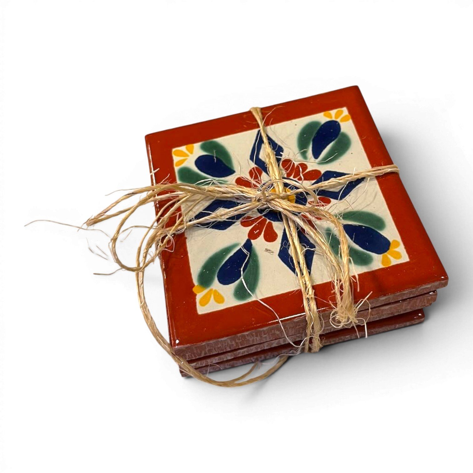 Set of four colorful Talavera tile coasters with hand-painted Mexican pottery designs