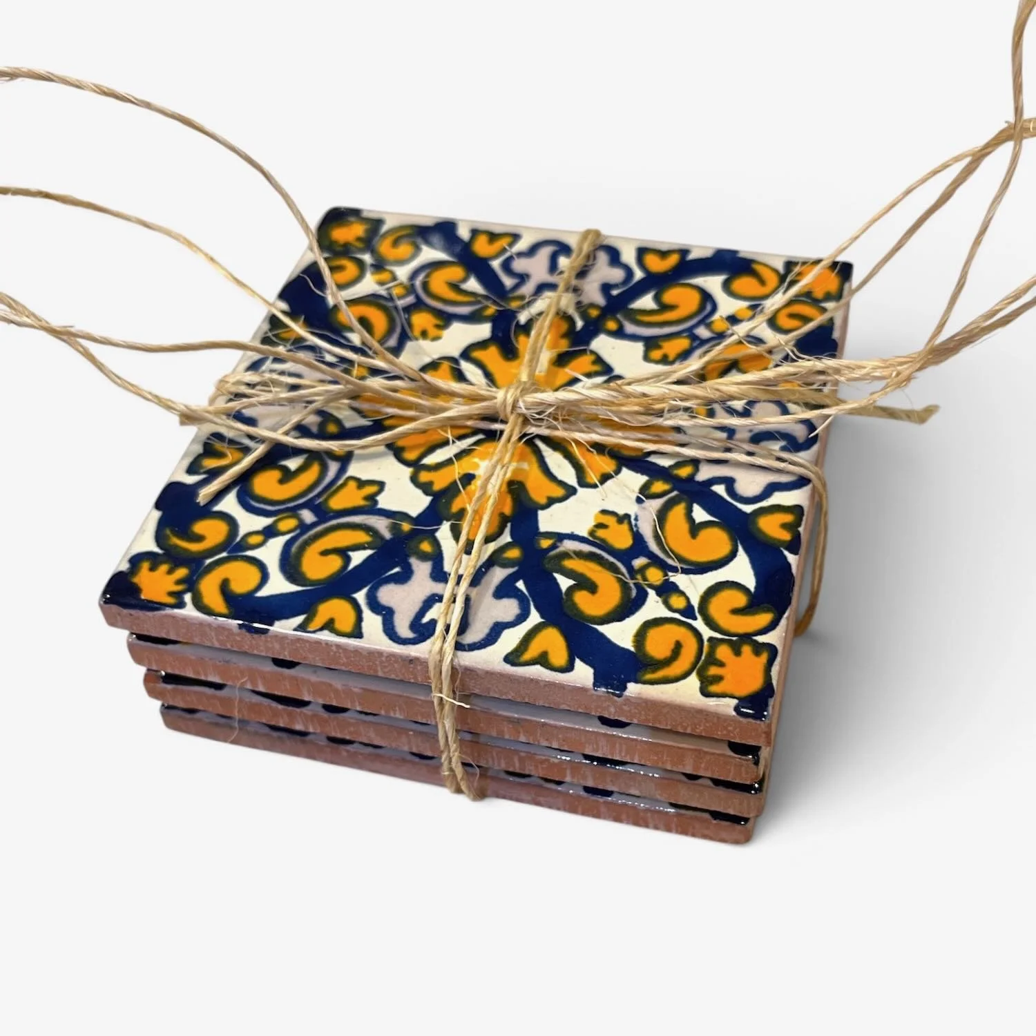 Handmade Talavera tile coaster set from Mexico featuring four colorful ceramic coasters with protective rubber bumpers.