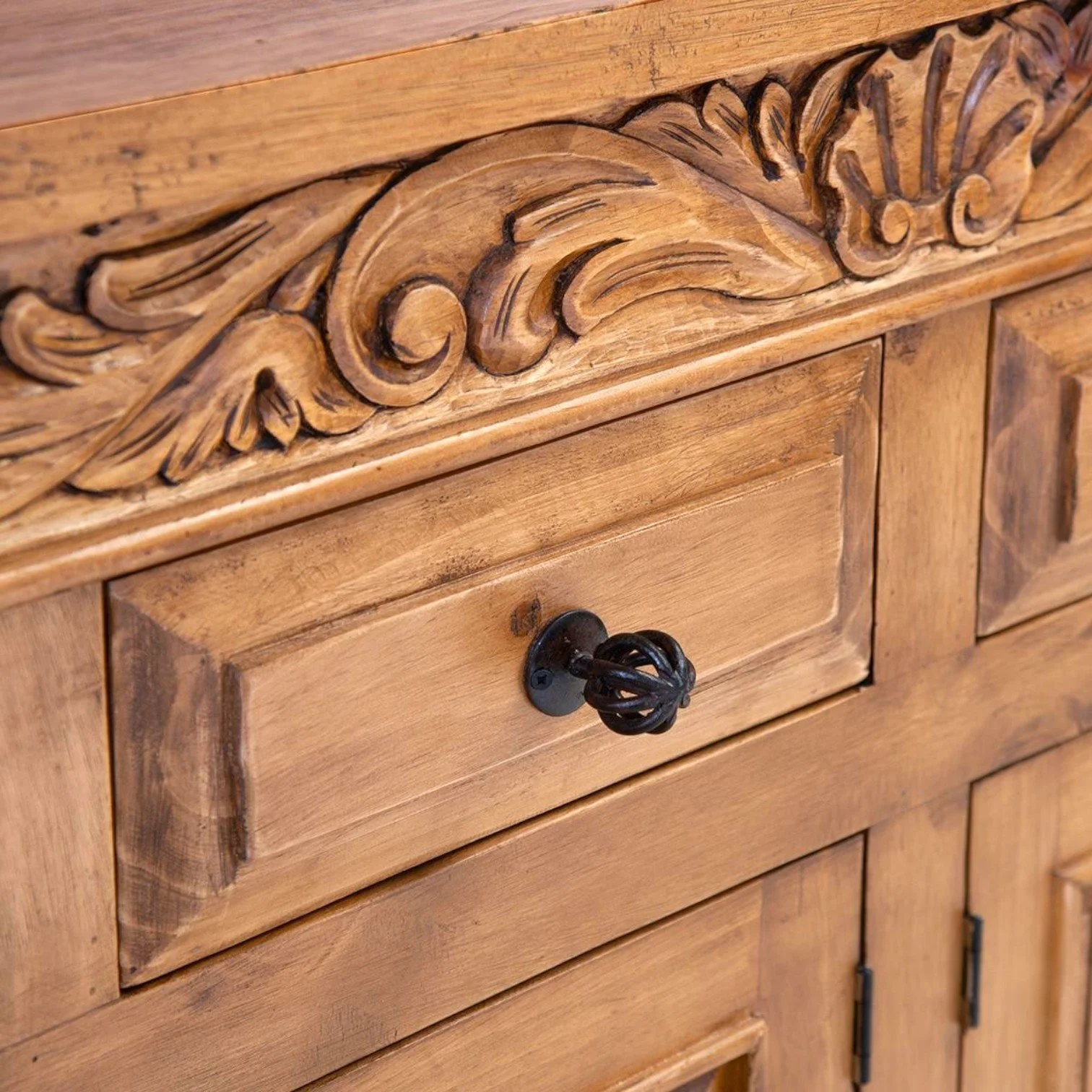 Handmade Las Cuevas Especial dark rustic buffet with hand-carved details and iron hardware crafted in Mexico.