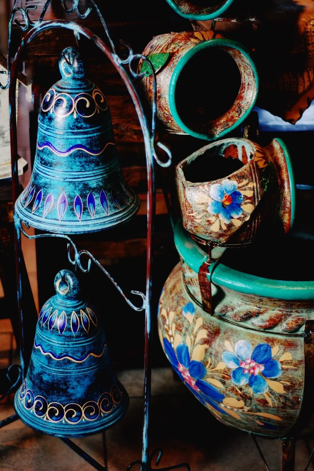 Clay bells and colorful fountain from Mexico. Visit Milagros Rústicos in Arizona today.