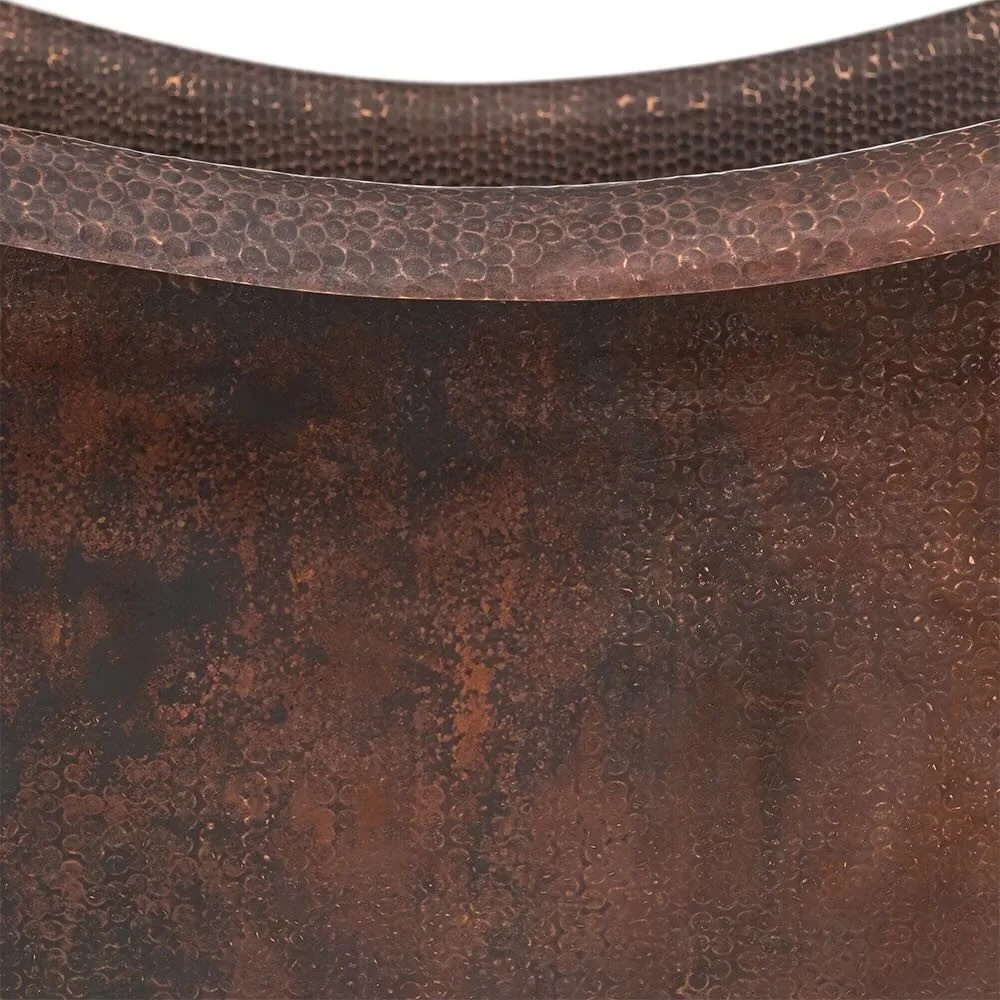 Handmade Hacienda 67-inch hammered copper double slipper bathtub with decorative copper ring accents crafted in Mexico.