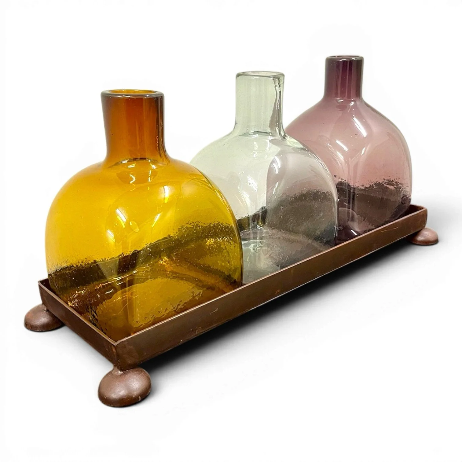 Handmade Mexican serving set featuring three handblown glass bottles and a handcrafted iron tray, perfect for entertaining and rustic décor.