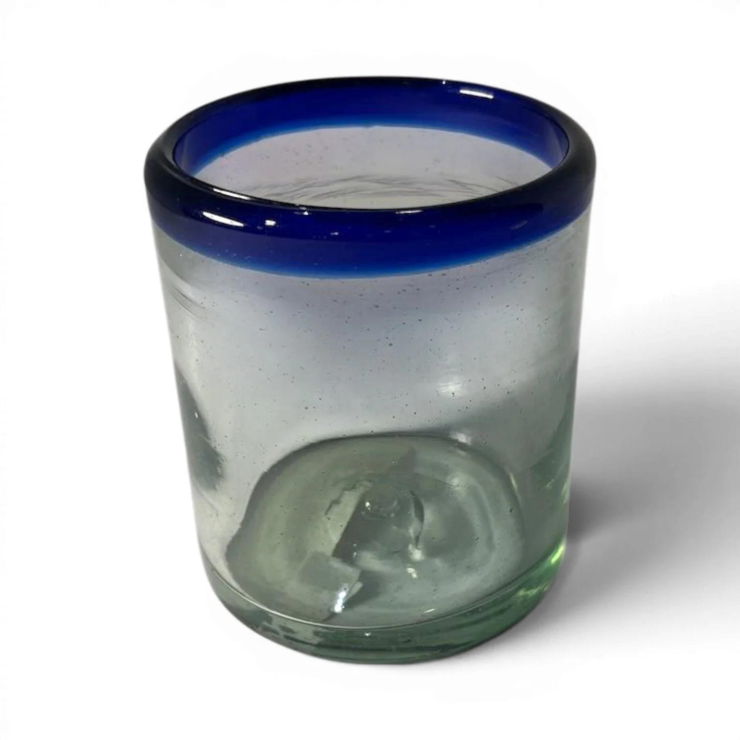 Handmade Mexican Cantina short glass with traditional cobalt blue rim and handblown artisan craftsmanship.