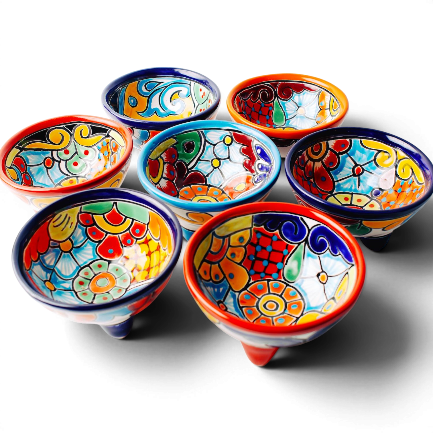 Handmade Mexican Talavera molcajete bowl with colorful hand-painted design and three-legged base