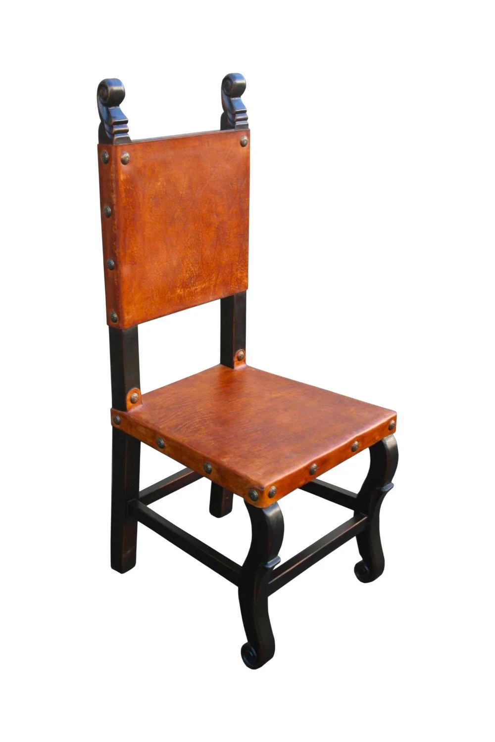 Shop the Belisario Leather Dining Chair handmade in Peru. Premium leather, carved wood frame, and clavos trim for elegant Old World dining seating.